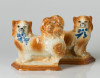 "Pareja de perros pekineses", figuras de loza esmaltada Sta