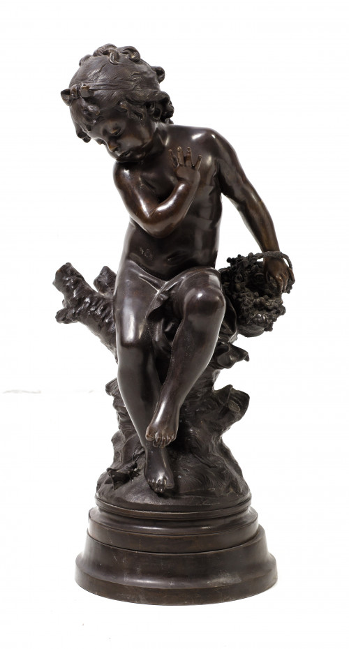 "Niño con cesto de flores"