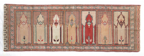 Alfombra de oración de lana con decoración arquitectónica y