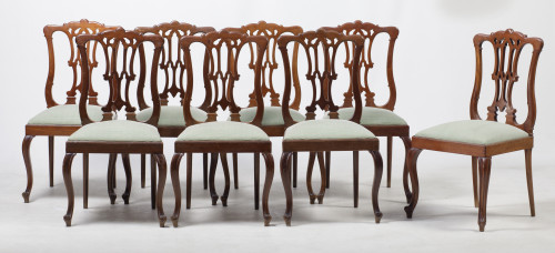 Ocho sillas de madera de estilo Chippendale, med. S. XX
