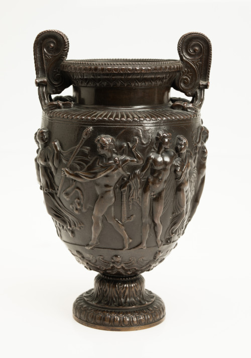 Patinated bronze urn according to the taste of the Grand To