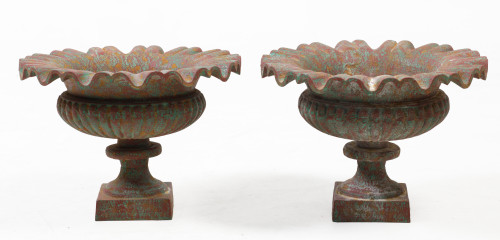 Pair of iron cups with a sinuous profile and a gallon body,