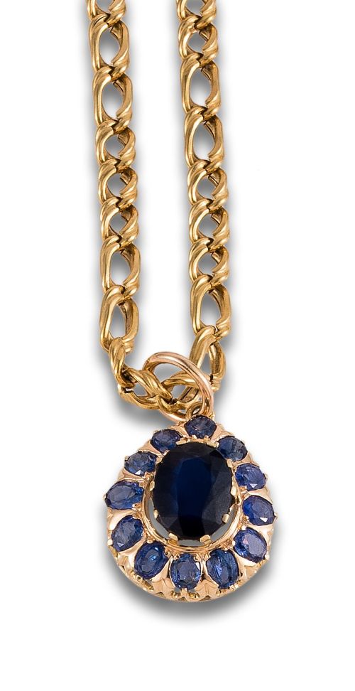 SAPPHIRE PENDANT, IN YELLOW GOLD WITH CHAIN
