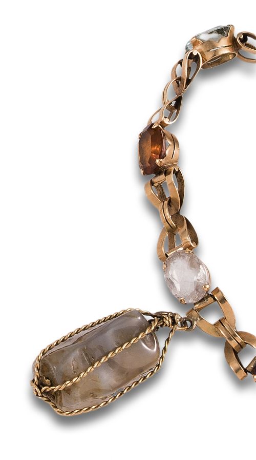 PULSERA, AÑOS 40, DE ORO AMARILLO Y PIEDRAS DE COLOR