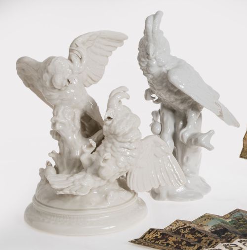 "Parrots" Two groups of white glazed porcelain. 20th centur