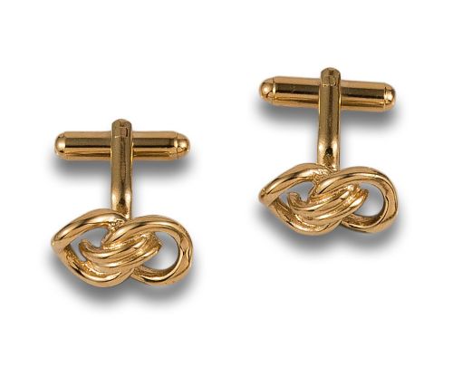 GEMELOS EN FORMA DE NUDO