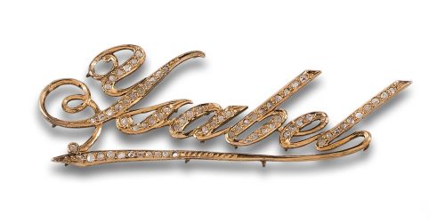 PLACA NOMINAL EN ORO Y DIAMANTES