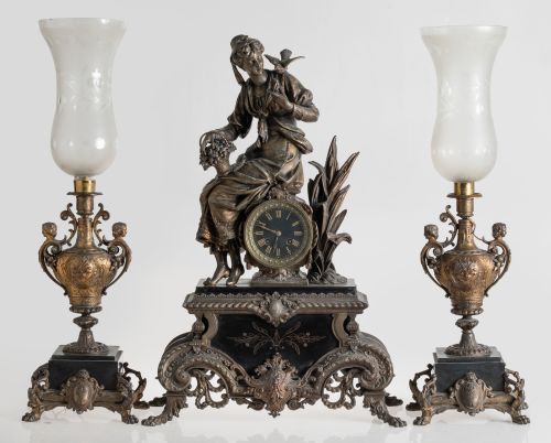 Set of table clock and pairs of vases in black marble and c