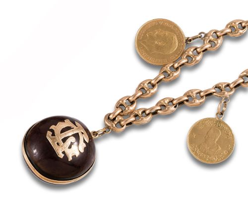 PULSERA DE ORO DE CALABROTES CON DIJES Y MONEDAS COLGANTES