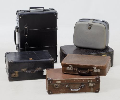 Collection of five malts and a toiletry bag, 20th century