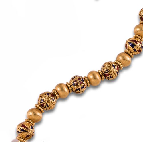 PULSERA DE ESTILO ORIENTAL EN ORO DE 24 KT. Y DIAMANTES