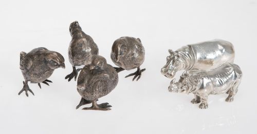 Lote compuesto por figura de rinoceronte y de hipopótamo de