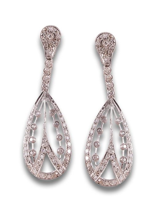 Long, antique-style diamond earrings in platinum