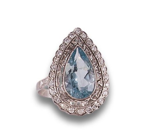 Antique style aquamarine and diamond ring in platinum