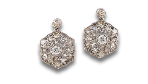 Long, antique-style diamond earrings in platinum