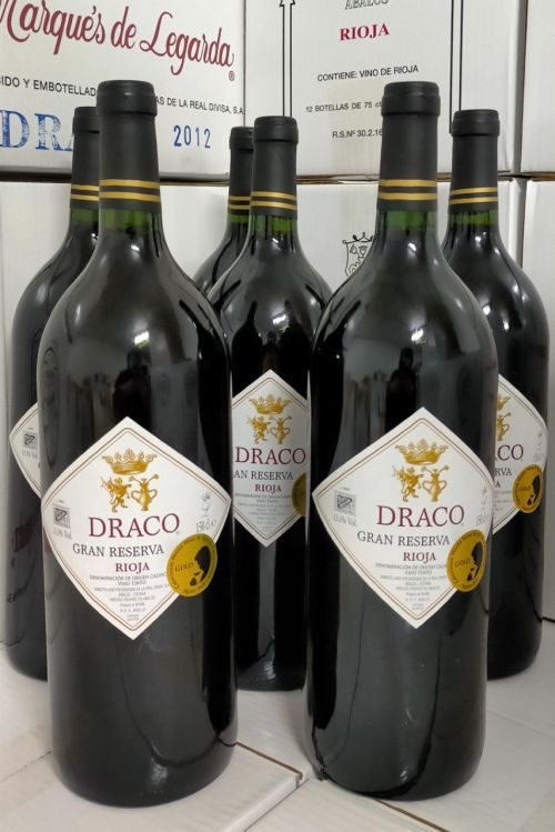 Six magnum bottles (1.5 liters) of Draco Gran Reserva 2006.