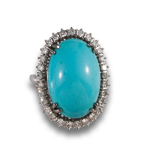 SORTIJA EN PLATINO CON CABUJÓN DE TURQUESA Y DIAMANTES