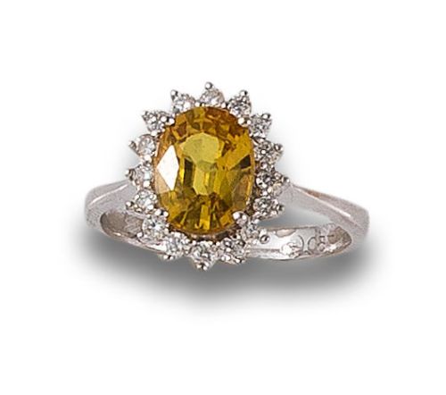 SORTIJA EN ORO CON ZAFIRO NARANJA Y DIAMANTES