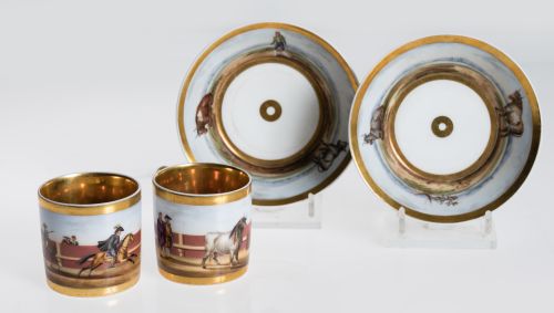 Pareja de tazas con sus platos porcelana S.XIX. 