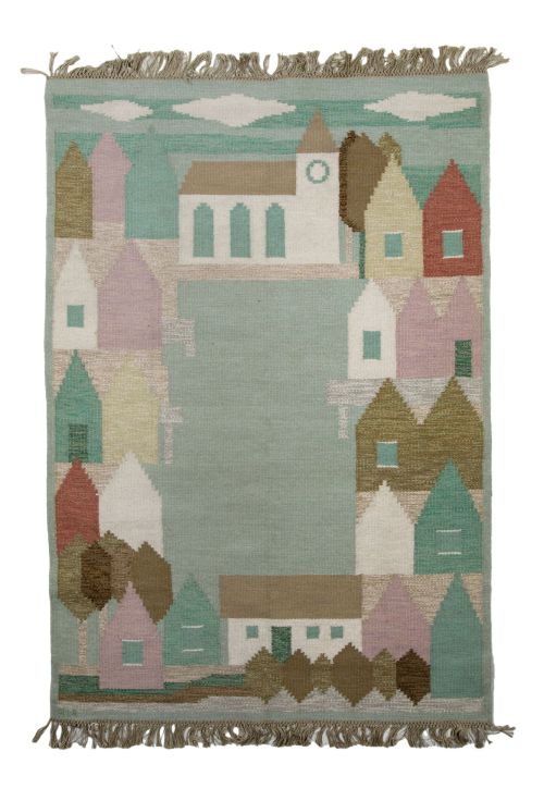 Hand-knotted wool rug from NAIF cardboard