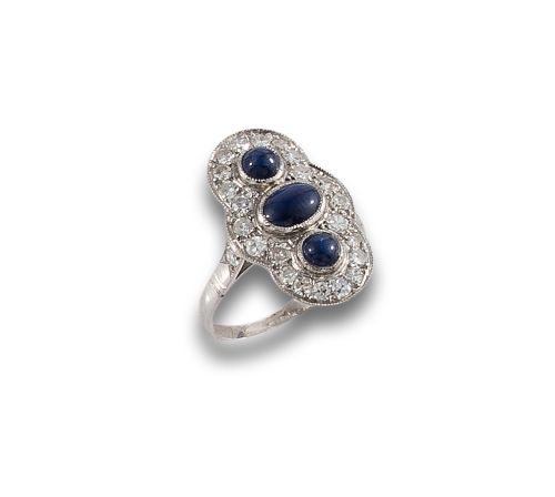 PLATINUM COCKTAIL RING WITH SAPPHIRES AND DIAMONDS
