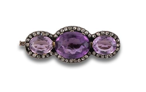 BROCHE DE PLATA Y ORO CON AMATISTAS