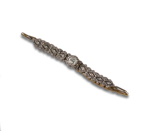 BRAZALETE ANTIGUO DE ORO, PLATINO Y DIAMANTES.