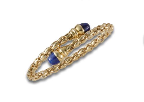 BRAZALETE TORQUES DE ORO Y LAPISLÁZULI.