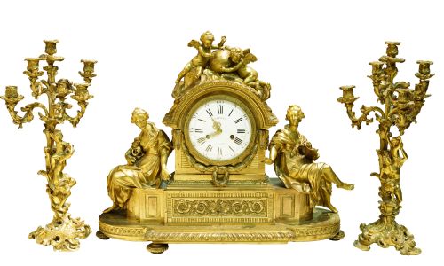 Clock garniture and associated candlesticks, France, 19th c