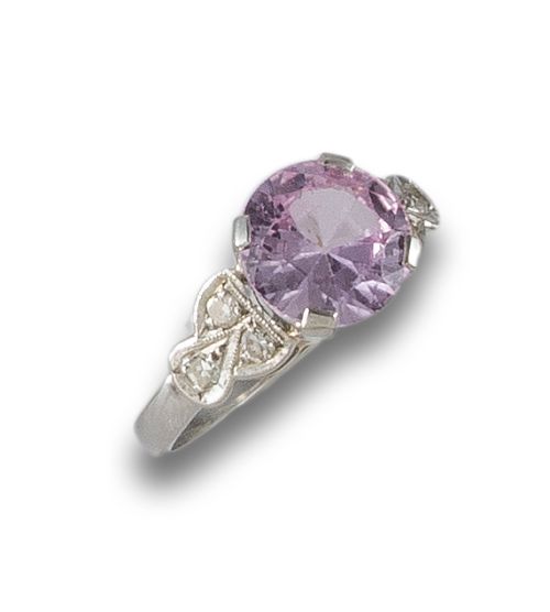 PLATINUM RING WITH ROSE OF FRANCE