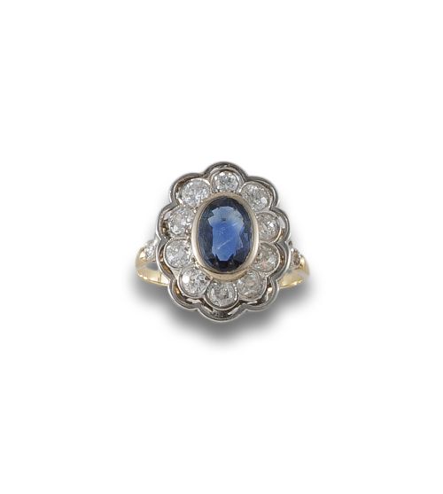 YELLOW GOLD AND PLATINUM RING WITH SAPPHIRE AND DIAMONDS