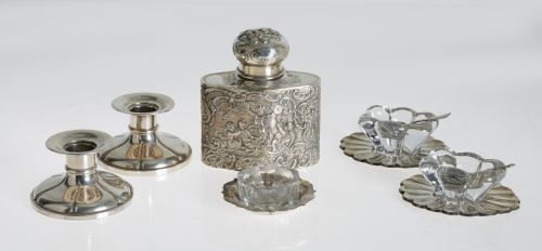 A jar, three pinch salt shakers, and two candlesticks of 91