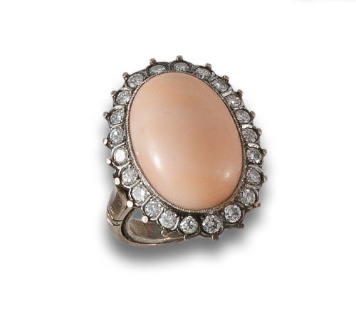 COCKTAIL RING WITH CORAL AND DIAMONDS