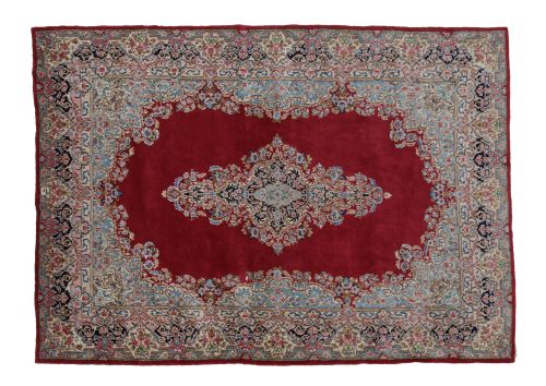 Persian rug (kirman) made of hand-knotted wool