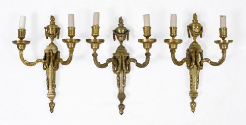 Three Louis XVI style wall lights, early 20th century