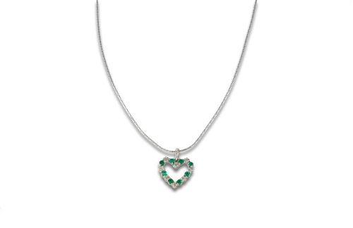 Necklace with heart pendant in gold, diamonds and emeralds