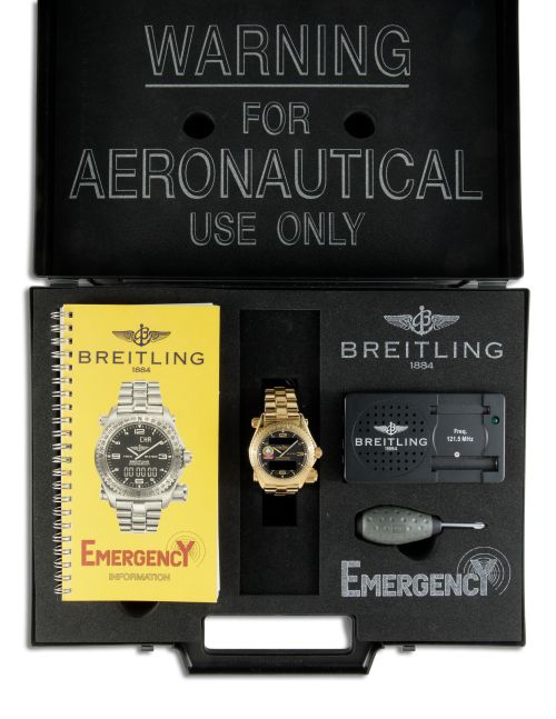 BREITLING EMERGENCY DE ORO CON MALETÍN Y GARANTIA