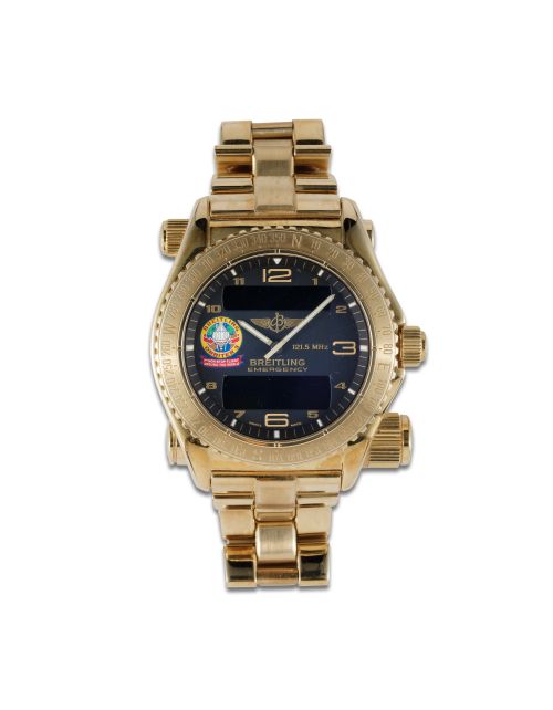 BREITLING EMERGENCY DE ORO CON MALETÍN Y GARANTIA