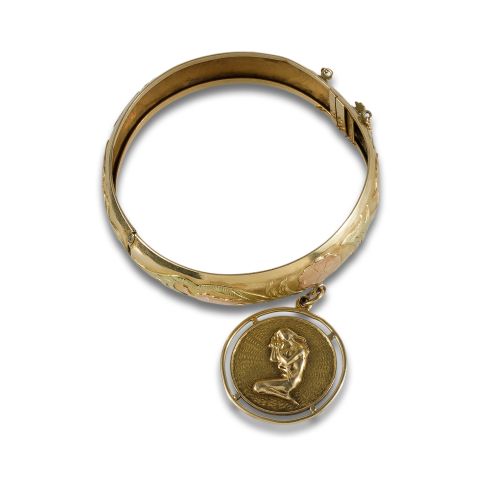 BRAZALETE SEMIRRÍGIDO DE ORO BICOLOR.