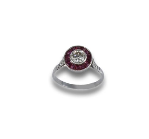 PLATINUM, DIAMOND AND RUBIES HALO RING