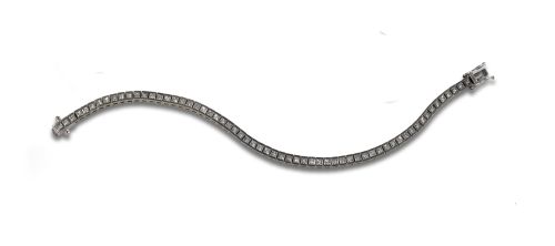 GOLD AND PRINCESS CUT DIAMOND RIVIERE BRACELET