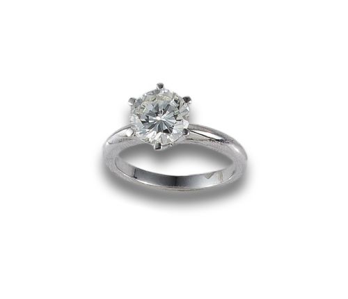 GOLD AND DIAMOND SOLITAIRE RING