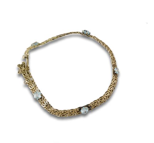 PULSERA DE ORO CON PIEDRAS AZULES
