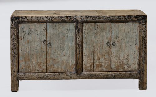 Sideboard made of distressed wood, following antique design