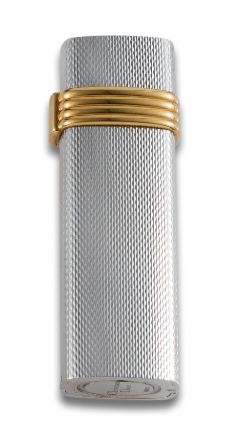 CHRISTIAN DIOR LIGHTER IN SILVER AND GOLD METAL