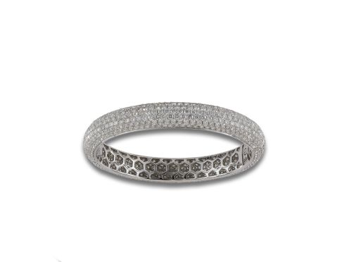 Rigid bracelet in gold and pave diamonds