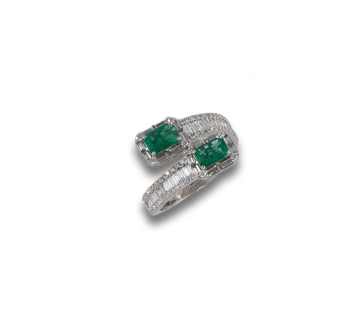 BYPASS RING IN GOLD, DIAMONDS AND EMERALDS.