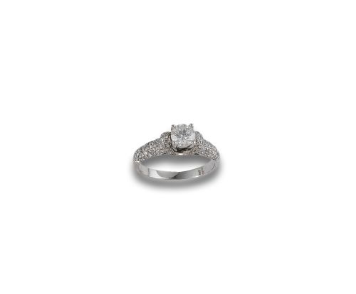GOLD AND DIAMOND SOLITAIRE RING