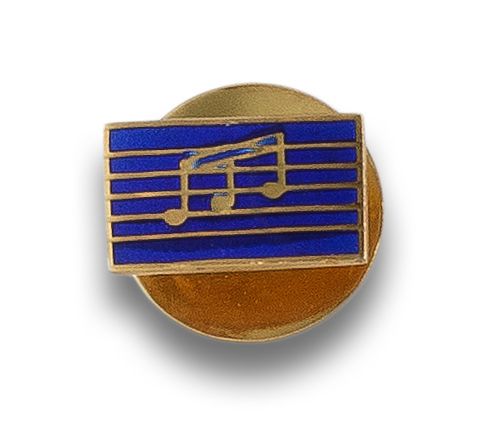 MUSICAL EMBLEM OF ENAMEL AND GILDED SILVER