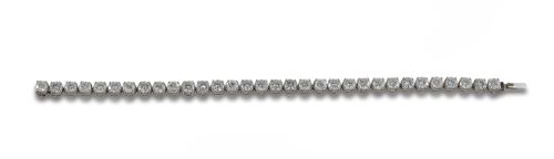 PULSERA RIVIERE EN ORO BLANCO CON BRILLANTES